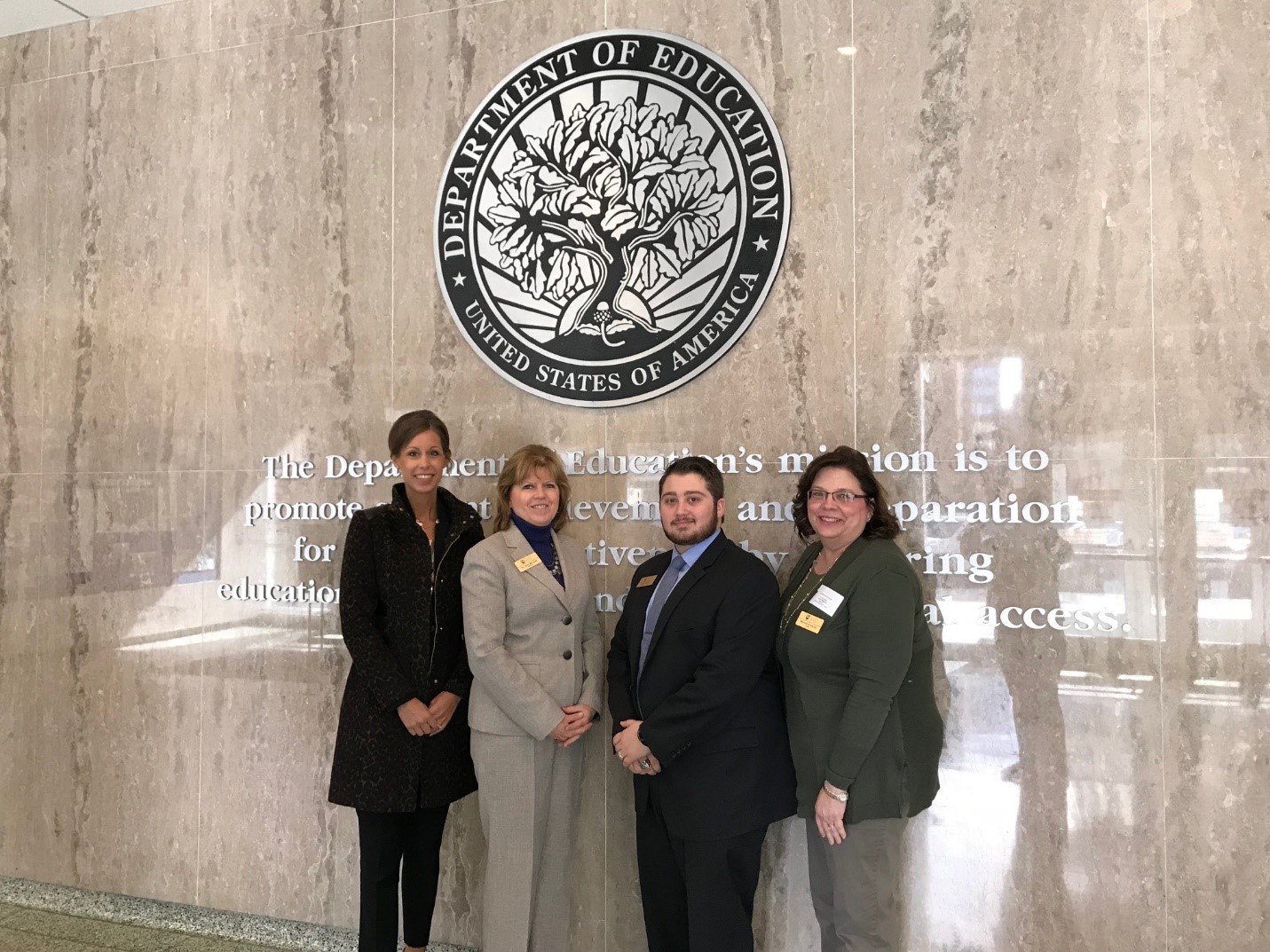 JJC Executive Director of Communications and Marketing Kelly Rohder-Tonelli, President Dr. Judy Mitchell, Board of Trustees Vice Chairwoman Maureen Broderick, and Student Trustee Sante Deserio