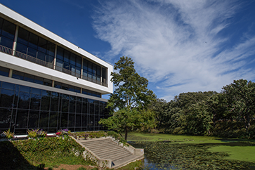 JJC building overlooking the natural landscape of campus.