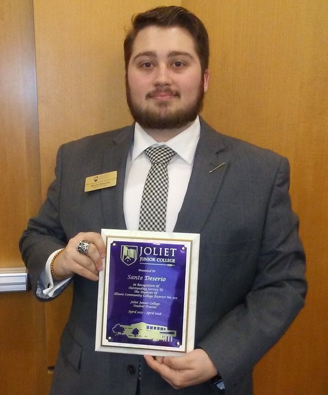 Sante Deserio with his service award plaque received on April 11.