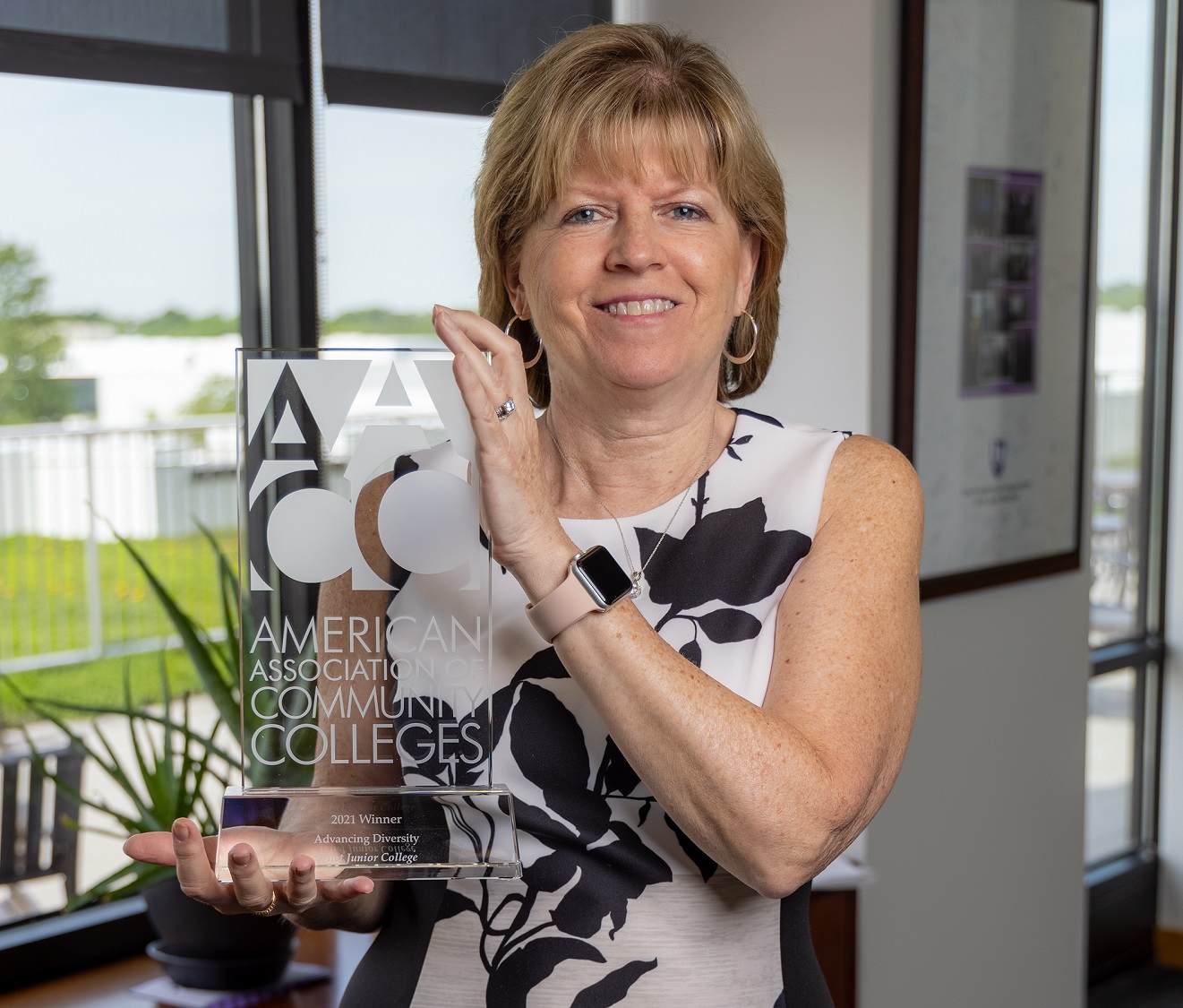 President Mitchell with the AACC Award