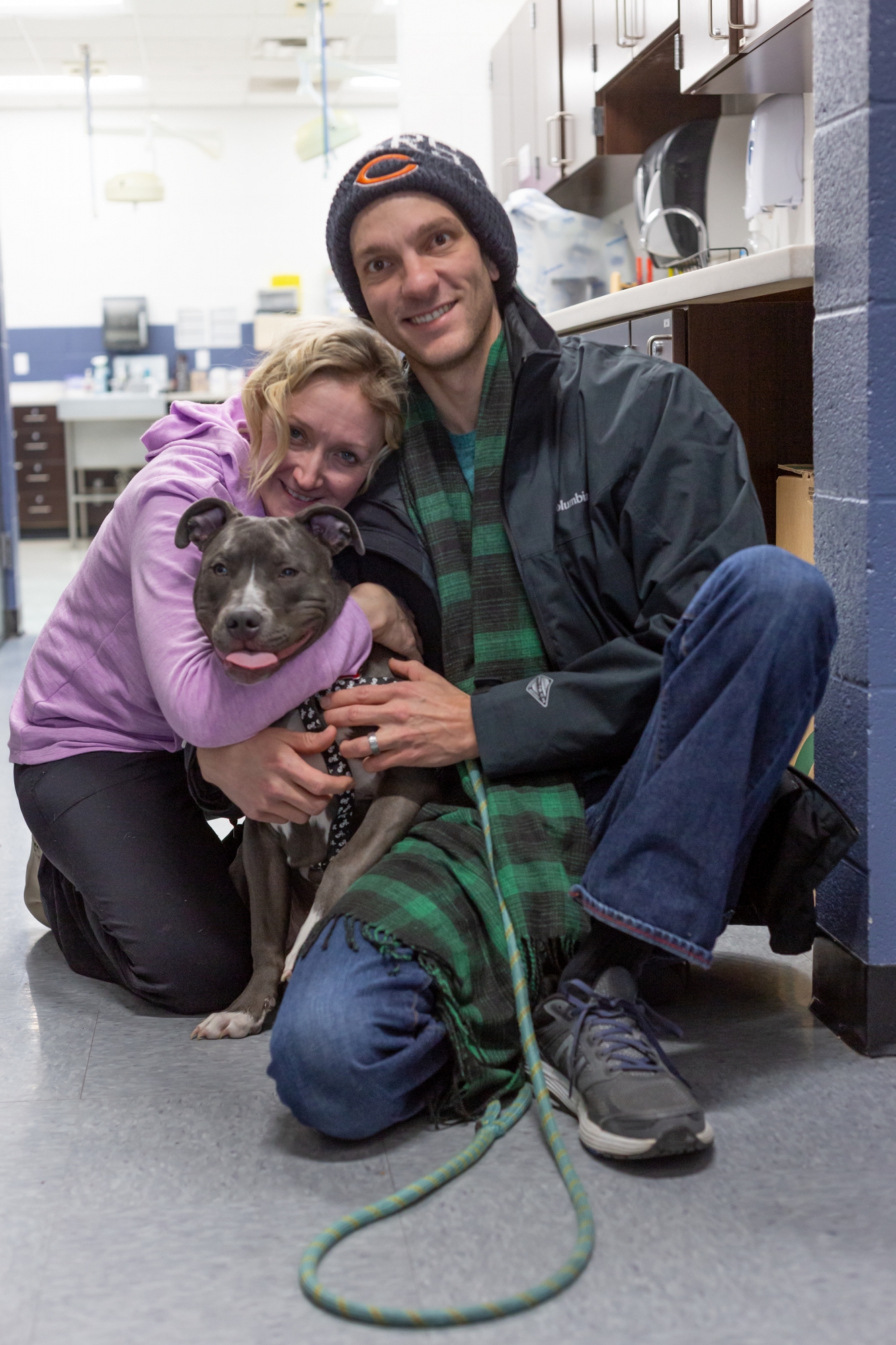 Woodie and his parents, Jenn and David Grelck