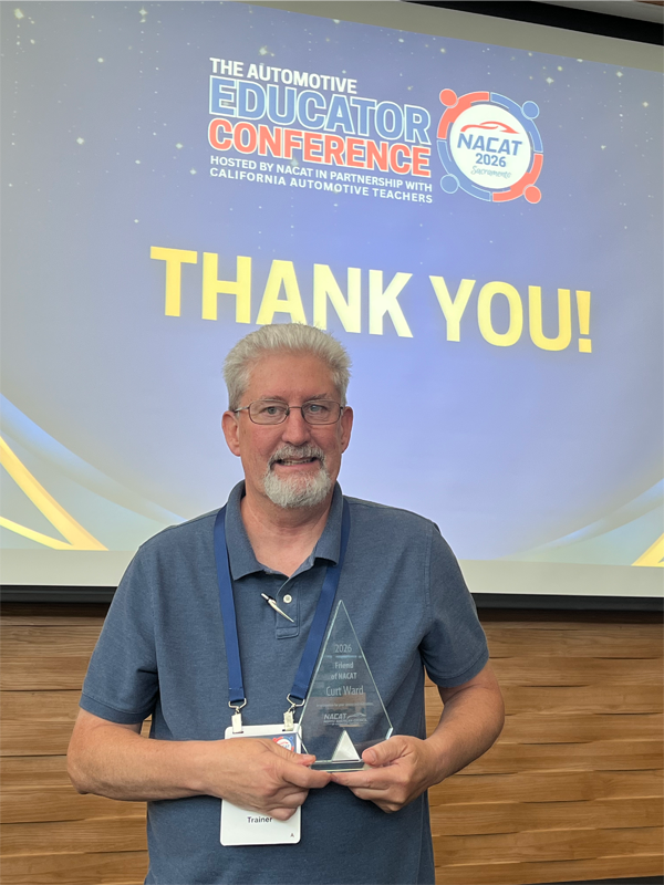 Curt Ward holding award