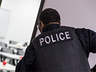 Photo of a JJC police officer participating in a drill