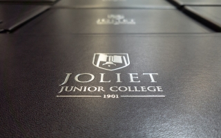 diploma cover embossed with silver Joliet Junior College logo