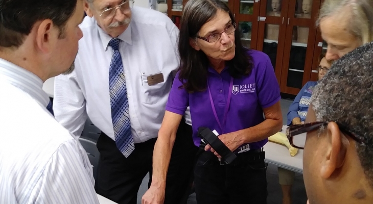 EMS Coordinator Charlotte Garrabrant shows participants how to pack a wound