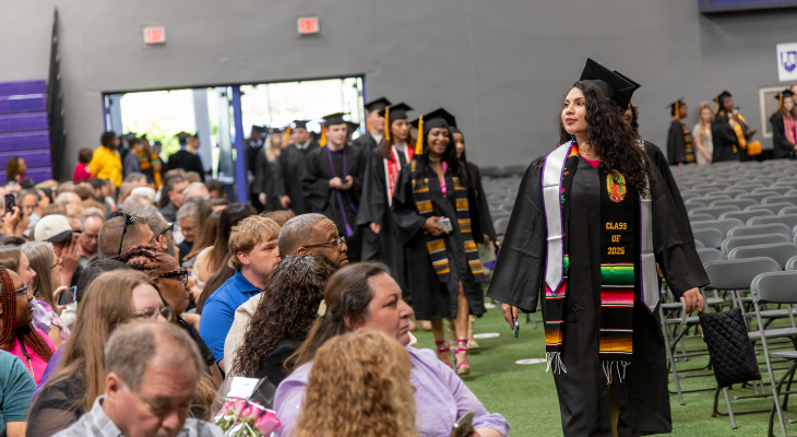 jjc graduates enter the event center