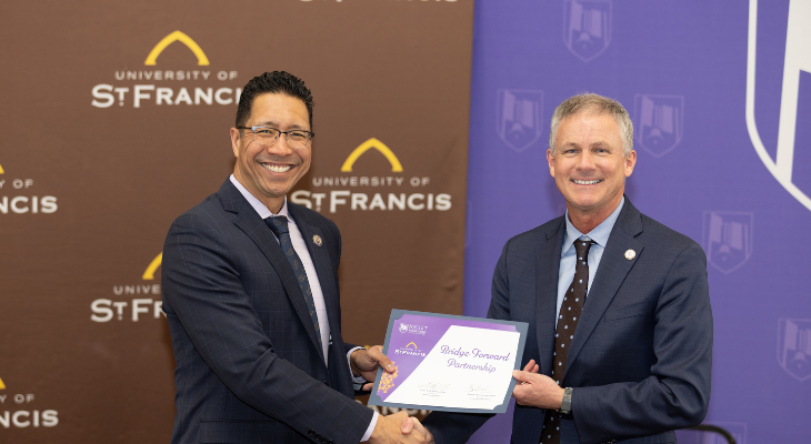 presidents namuo and hendrickson hold certificate