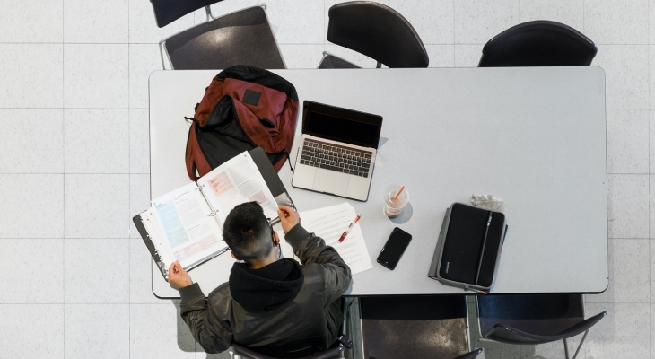 aerial photo of student studying at table