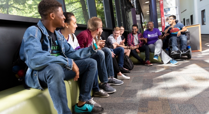 students sitting and laughing